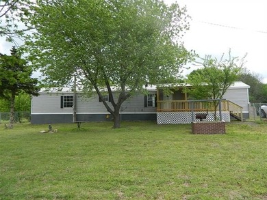 1.19 acres with a 50 x 60 insulated shop w/electric. Many - photo 1