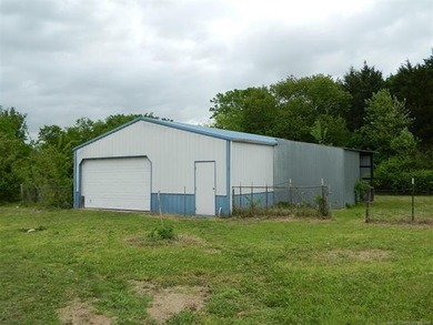 1.19 acres with a 50 x 60 insulated shop w/electric. Many - photo 2