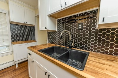 Welcome to 441 Benton Street! This Cape Cod style home located - photo 11
