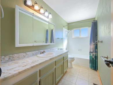 At the end of a quiet cul-de-sac in Orchard Mesa, this inviting