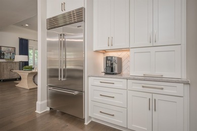 LIKE-NEW CUSTOM GOLF COURSE HOME POSITIONED ALONG THE 8TH HOLE - photo 15