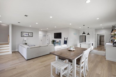 This stunning 3,500-square-foot lake home, located less than 2 - photo 2