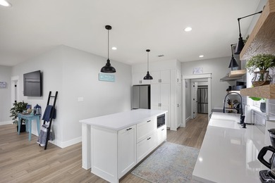 This stunning 3,500-square-foot lake home, located less than 2 - photo 8