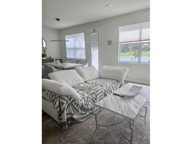 Rare Corner Townhome | Lake & Park Views | Premium Upgrades - photo 1