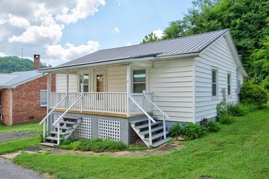 Welcome to this charming cottage nestled in the heart of Fries - photo 2