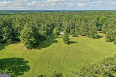 Zoned R-2, the property allows for one home per half-acre and - photo 7