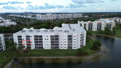Third-floor apartment located in the community of Doral Isles - - photo 2