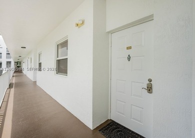 Third-floor apartment located in the community of Doral Isles - - photo 6