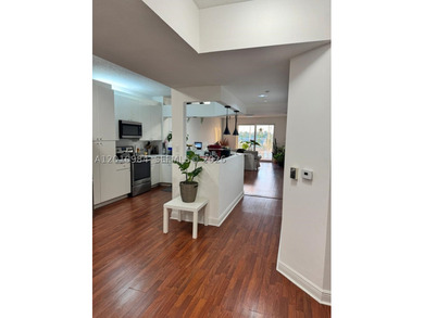 Third-floor apartment located in the community of Doral Isles - - photo 8