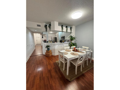 Third-floor apartment located in the community of Doral Isles - - photo 10