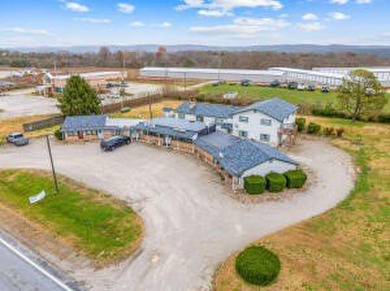 Discover an exceptional real estate opportunity that encompasses - photo 2
