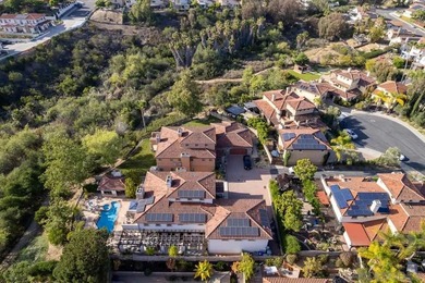 The biggest home for sale in 92129. You may have passed by and - photo 4