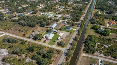 Stunning Custom Estate on 1 Acre Corner Lot with Pool, Metal - photo 34