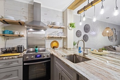 Welcome to this beautifully updated 1 bedroom, 1.5 bath condo - photo 2