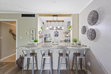 Welcome to this beautifully updated 1 bedroom, 1.5 bath condo - photo 4