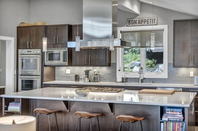 This distinctive home sits on 1.19 acres and offers lake views - photo 11