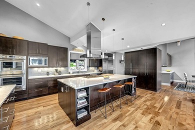 This distinctive home sits on 1.19 acres and offers lake views - photo 12