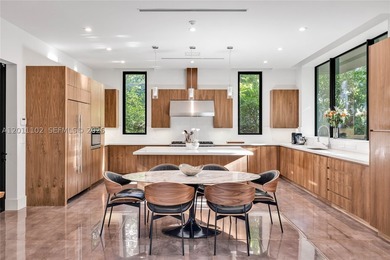 Stunning Coconut Grove residence showcasing soaring ceilings and - photo 21