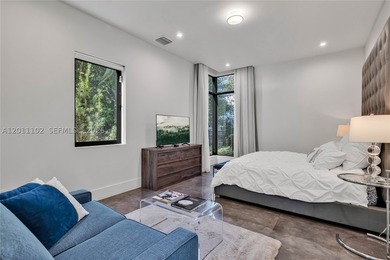 Stunning Coconut Grove residence showcasing soaring ceilings and - photo 29