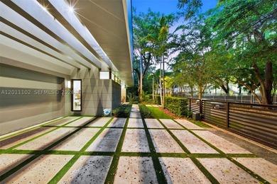 Stunning Coconut Grove residence showcasing soaring ceilings and - photo 32