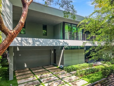 Stunning Coconut Grove residence showcasing soaring ceilings and - photo 33