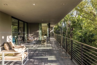 Stunning Coconut Grove residence showcasing soaring ceilings and - photo 38