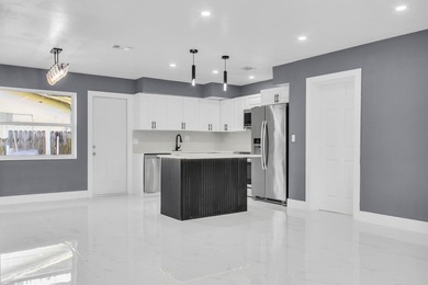 Priced to sell! Step into modern living with this freshly - photo 1