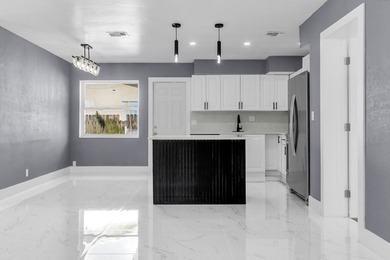 Priced to sell! Step into modern living with this freshly - photo 6