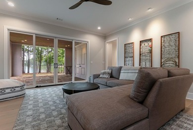 STUNNING LAKE HOME, NEWER CONSTRUCTION, OFFERED FURNISHED AND - photo 38
