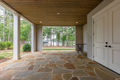 STUNNING LAKE HOME, NEWER CONSTRUCTION, OFFERED FURNISHED AND - photo 50
