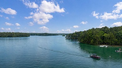 STUNNING LAKE HOME, NEWER CONSTRUCTION, OFFERED FURNISHED AND - photo 53