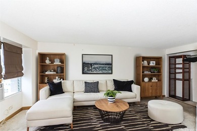 Enjoy panoramic mountain and city vistas from this high-floor - photo 3