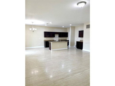 This 4/2 home has a renovated interior showcasing modern - photo 2