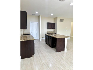 This 4/2 home has a renovated interior showcasing modern - photo 3