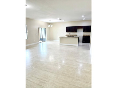 This 4/2 home has a renovated interior showcasing modern - photo 5
