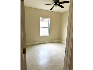 This 4/2 home has a renovated interior showcasing modern - photo 6