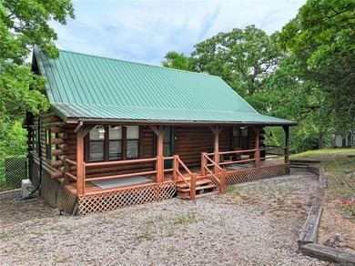 Cozy Log Cabin Tucked Away in the Trees Take the steps down to - photo 1