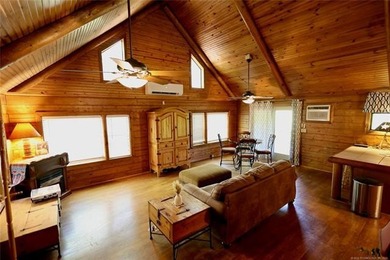 Cozy Log Cabin Tucked Away in the Trees Take the steps down to - photo 2
