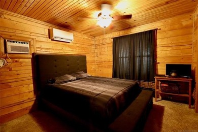 Cozy Log Cabin Tucked Away in the Trees Take the steps down to - photo 8