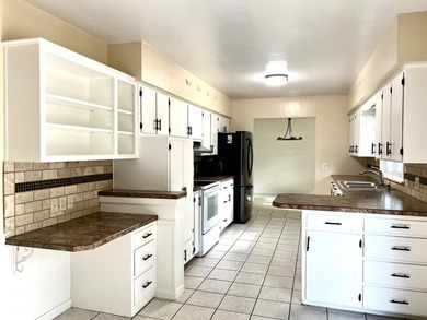 Welcome to this marvelous mid-century modern brick ranch, where - photo 12