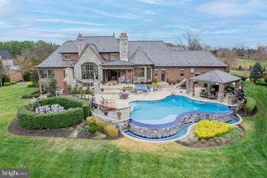 Welcome home to this remarkable estate set behind the gates of - photo 3