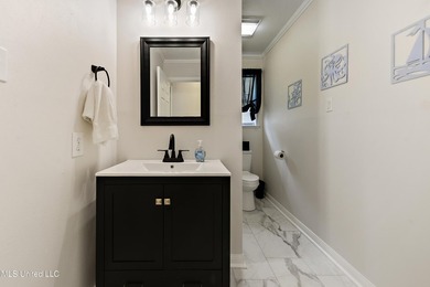 This charming cottage in Bay St. Louis is delightful. With its - photo 15