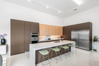 Completely renovated modern home with soaring ceilings and - photo 4
