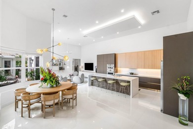 Completely renovated modern home with soaring ceilings and - photo 7