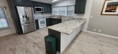 Discover carefree living in this delightfully updated home - photo 5