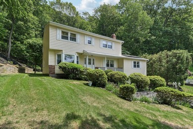 Nestled on a beautifully landscaped cul-de-sac, this - photo 4