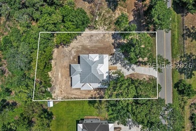 Set on 1.05 acres with marsh-to-Broad River views, 2493 Knowles - photo 10