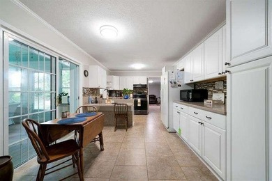 $10,000 SELLER CONTRIBUTION TOWARDS BUYER'S CLOSING COSTS OR