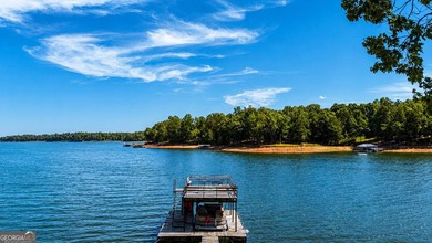 This cute cabin on year-round deep water is the lakefront - photo 18