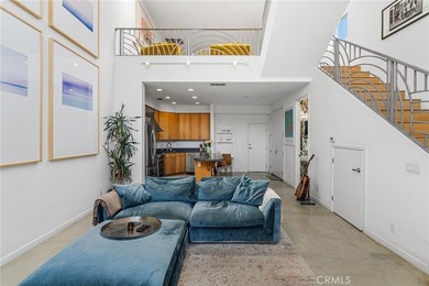 Behind privacy gates in the coveted Artist Lofts, this move-in - photo 3